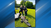 Charleston police free alligator trapped in garden hose