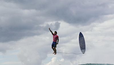 Greatest surf shot ever? Photographer describes Olympic coverage success