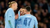 Man City and second-tier Coventry reach FA Cup semis. Tottenham beaten heavily in Premier League