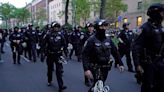 Riot police storm protesters at Columbia – latest news