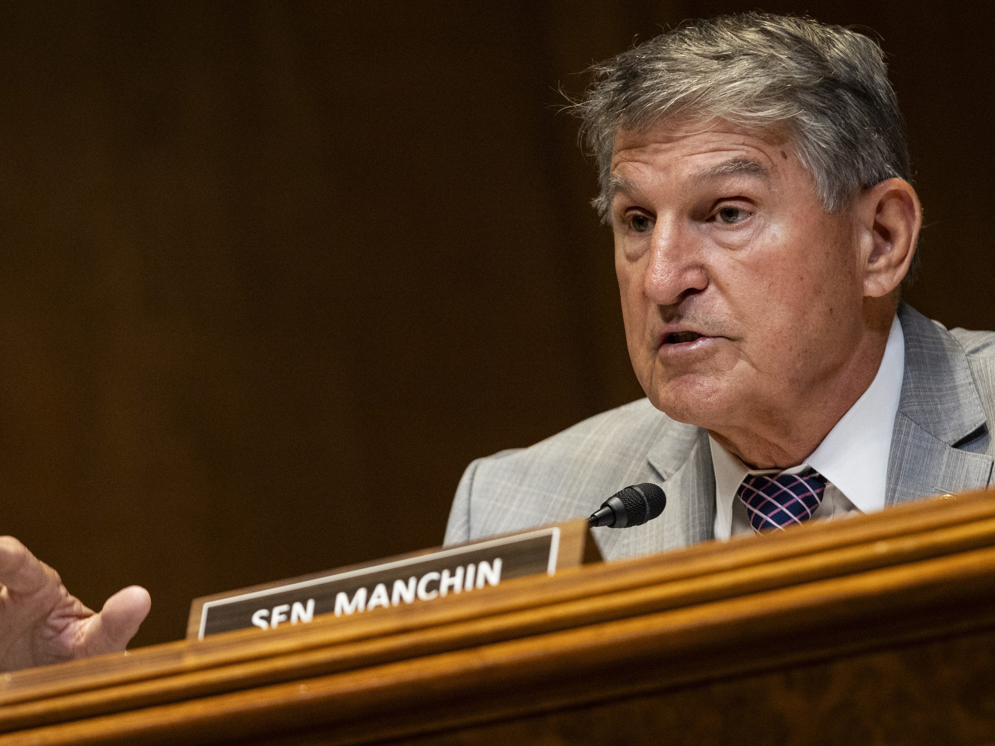 Joe Manchin calls on Biden to exit the presidential race and 'pass the torch to a new generation'