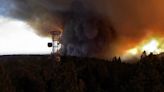 Firefighters continue battle against more than 100 blazes burning in the US