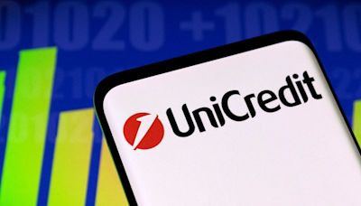 UniCredit tops profit forecast, buys cloud-based bank
