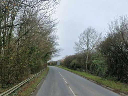 Man dies in crash which closed busy road for hours
