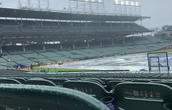 Cincinnati Reds-Chicago Cubs start delayed by rain in Chicago Saturday night