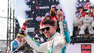 Denny Hamlin holds off Larson late to win NASCAR Cup race at Dover Motor Speedway