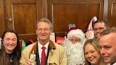 I showed up to a GOP congressman's 16-minute Christmas party. Here's what it was like to watch Democrats and Republicans rub shoulders in his cramped Capitol Hill office.