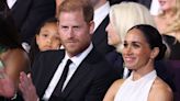 Meghan exudes easy elegance in a white halterneck gown for surprise red-carpet appearance