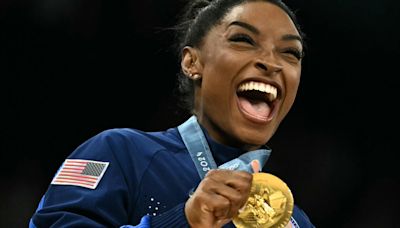 Brilliant Biles leads USA to Olympic women's team gold