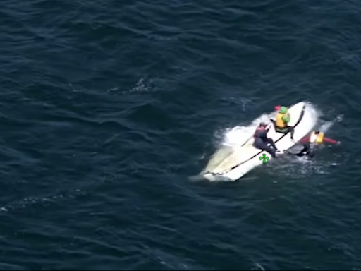 Two cling to boat after it capsizes in the middle of a bay, California deputies say