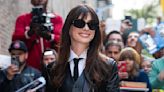 Anne Hathaway Taps Into Andy Sachs's Spirit With a Skintight Leather Suit