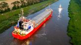 Ship that got stuck in a Cambridgeshire river rescued by two tug boats