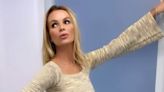 Amanda Holden braves the cold as she wows in clingy dress