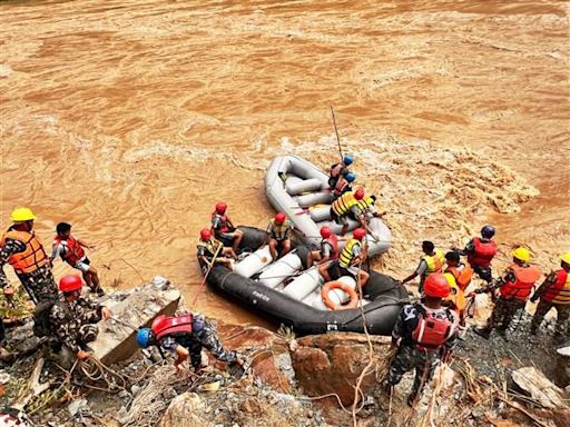 Rescuers recover body of Indian from 2 buses swept away in mudslide in Nepal