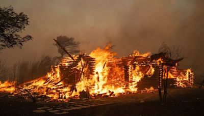 Greece: Wildfire rages out of control just outside Athens as temperatures in capital near 40C