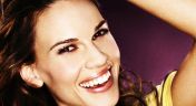 13. Hilary Swank; 50 Cent