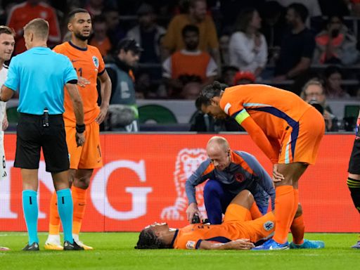 Nathan Ake carried off as Netherlands and Germany draw in Amsterdam