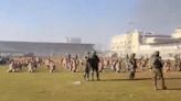 Israel-Hamas war: Video appears to show IDF soldiers rounding up half-naked men in Gaza stadium