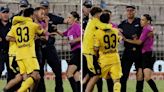 History-making female referee rushed off pitch by police in shocking scenes