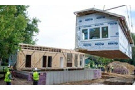 Professional basketball player turned housing developer, Gorgui Dieng, is watching the clock and likes what he sees