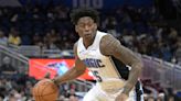 Admiral Schofield re-signs with Magic