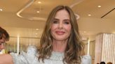 Trinny Woodall looks glamorous in silver maxi dress for store opening