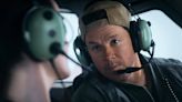 Mark Wahlberg’s Bald Hitman Takes to the Skies in ‘Flight Risk’ Trailer | Video