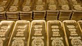 Gold prices fall from record highs as rate fears persist; copper retreats