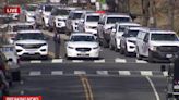 Washington DC standoff ends with arrest of gunman who shot three officers