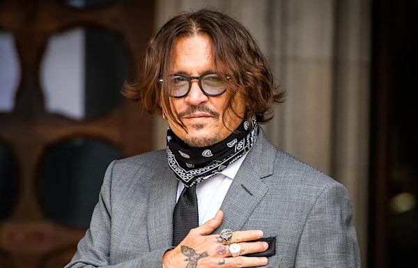 Johnny Depp pays respect to late 'Pirates of the Caribbean' actor Tamayo Perry who was killed in shark attack