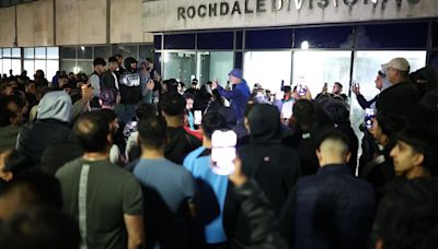 Hundreds mass at police station after Manchester Airport arrests