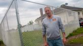 Overgrown grass, locked gates have Staten Island man looking for action at neighboring NYC properties