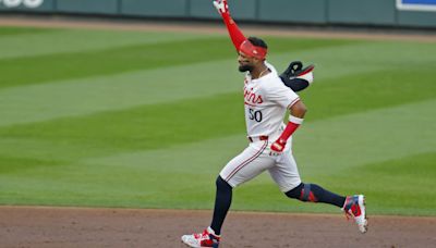 Twins beat Royals 8-3 with home runs by Castro and Lewis in 6-run 2nd inning off Singer