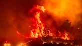 California's largest wildfire explodes in size as fires rage across US West