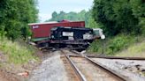 Train derails in Columbia causing injuries and fuel spill, fire department says