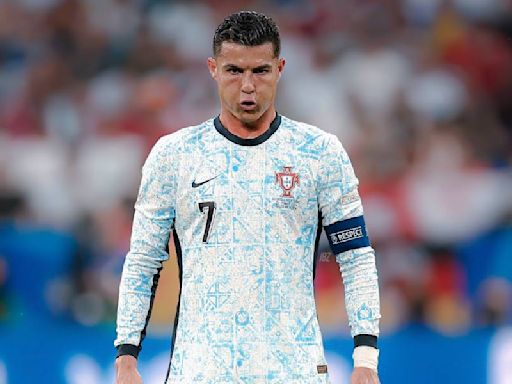 Cristiano Ronaldo narrowly avoided being hit by fan who jumped from crowd to get to him at Euro 2024