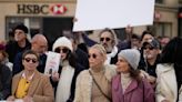 French performers lead a silent Paris march for peace between Israelis and Palestinians