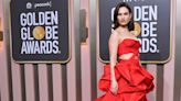 Lily James Fires Up the 2023 Golden Globes Red Carpet in Ruffled Scarlet Gown