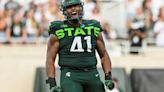 Michigan State football transfer DT Derrick Harmon reportedly still considering return to MSU along with four other schools