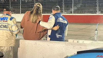 Class Act: Competitor Assists Wife of Chase Briscoe Over Darlington Pit Road Wall