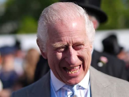 King Charles looks in his element to be at Queen Camilla's side at first royal garden party of the year as they're joined by Princess Anne and Sophie