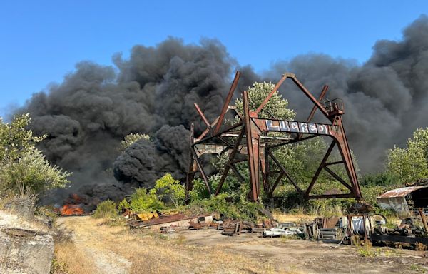 Dark smoke billows on Ross Island due to large fire in abandoned structure