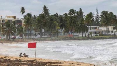 Hurricane Ernesto drops torrential rain on Puerto Rico while pummeling northeast Caribbean