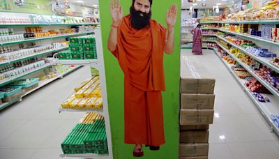 Indian state suspends licences of 14 products of yoga guru in latest setback