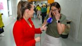 Swimming great Hayley Lewis fights back tears as son wins silver medal