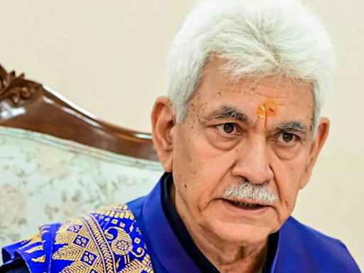 J&K LG Manoj Sinha dismisses four government officials over terror links | India News - Times of India