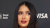 Salma Hayek Strikes a Sassy Pose in Sultry Body-Hugging Gown on Red Carpet