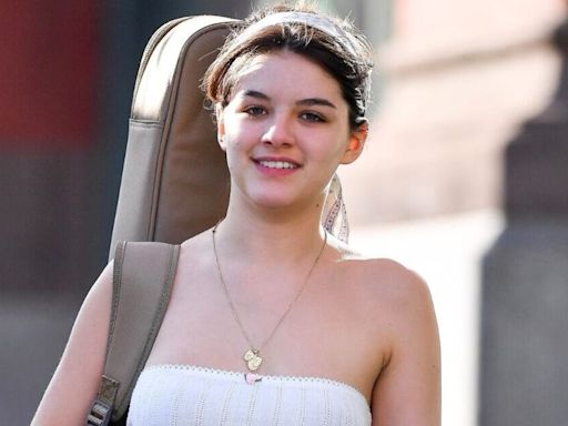 Suri Cruise, 18, flexes musical interest after ditching her dad's surname