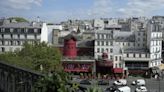 The windmill sails at Paris' iconic Moulin Rouge have collapsed. No injuries are reported