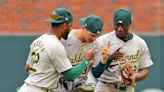 Andujar and Rooker lead Oakland outburst as A's beat scuffling Braves